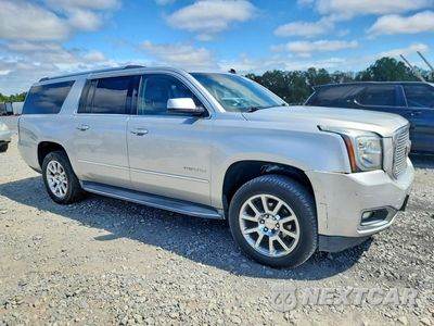 Czwarte zdjęcie samochodu z boku: 2015 GMC YUKON XL DENALI VIN:1GKS1JKJXFR177276 - miniatura