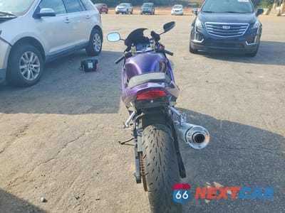 Czwarte zdjęcie samochodu z boku: 2004 SUZUKI GSX-R600 K VIN:JS1GN7CA142103798 - miniatura