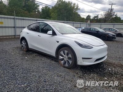 Czwarte zdjęcie samochodu z boku: 2023 TESLA MODEL Y VIN:7SAYGDED4PF933951 - miniatura