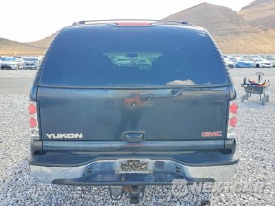 Zdjęcie 6 z 14 samochodu: 2002 GMC YUKON VIN:1GKEC13T22R295369 - miniatura