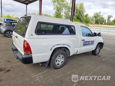 Trzecie zdjęcie samochodu z tyłu: 2014 TOYOTA TACOMA BASE VIN:5TFNX4CN3EX035078 - miniatura