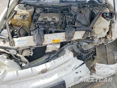 Zdjęcie 11 z 12 samochodu: 2001 CHEVROLET LUMINA VIN:2G1WL52J311257589 - miniatura