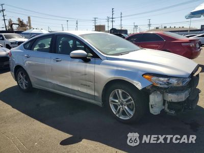 Czwarte zdjęcie samochodu z boku: 2018 FORD FUSION S HYBRID VIN:3FA6P0UU7JR273575 - miniatura