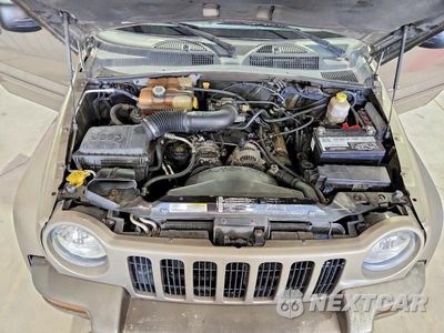 Zdjęcie 12 z 13 samochodu: 2004 JEEP LIBERTY LIMITED VIN:1J8GL58K34W195564 - miniatura