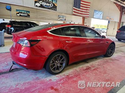 Trzecie zdjęcie samochodu z tyłu: 2018 TESLA MODEL 3 VIN:5YJ3E1EA5JF051440 - miniatura