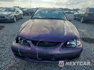 Piąte zdjęcie samochodu w środku: 1997 FORD MUSTANG VIN:1FALP4042VF161897 - miniatura