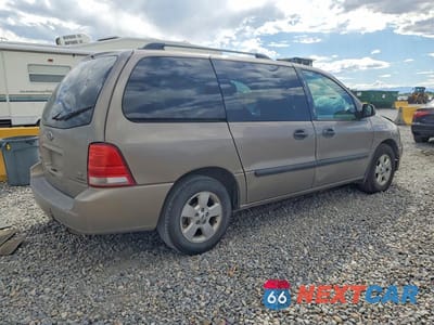 Trzecie zdjęcie samochodu z tyłu: 2006 FORD FREESTAR SE VIN:2FMZA51606BA55605 - miniatura