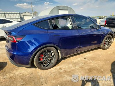 Trzecie zdjęcie samochodu z tyłu: 2022 TESLA MODEL Y VIN:7SAYGDEF1NF381937 - miniatura