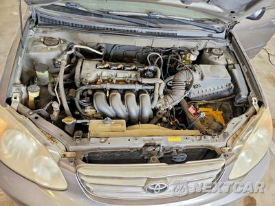 Zdjęcie 11 z 12 samochodu: 2004 TOYOTA COROLLA CE VIN:1NXBR32E44Z260596 - miniatura