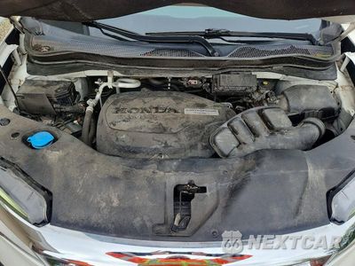 Zdjęcie 12 z 13 samochodu: 2020 HONDA PILOT TOURING VIN:5FNYF6H93LB020353 - miniatura