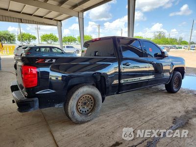 Trzecie zdjęcie samochodu z tyłu: 2018 CHEVROLET SILVERADO K1500 LT VIN:3GCUKREC5JG335495 - miniatura