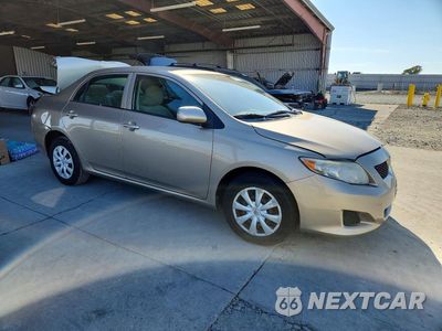 Czwarte zdjęcie samochodu z boku: 2009 TOYOTA COROLLA LE VIN:1NXBU40EX9Z010827 - miniatura