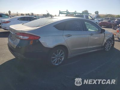 Trzecie zdjęcie samochodu z tyłu: 2017 FORD FUSION SE HYBRID VIN:3FA6P0LU2HR386250 - miniatura