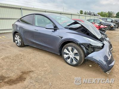 Czwarte zdjęcie samochodu z boku: 2023 TESLA MODEL Y VIN:7SAYGAEE7PF843796 - miniatura