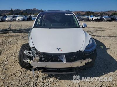 Piąte zdjęcie samochodu w środku: 2022 TESLA MODEL Y VIN:7SAYGAEE9NF490037 - miniatura