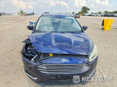 Piąte zdjęcie samochodu w środku: 2016 FORD FOCUS TITANIUM VIN:1FADP3J24GL347652 - miniatura