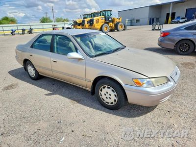 Czwarte zdjęcie samochodu z boku: 1999 TOYOTA CAMRY LE VIN:JT2BG28K4X0366651 - miniatura