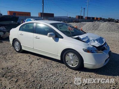 Czwarte zdjęcie samochodu z boku: 2006 HONDA CIVIC HYBRID VIN:JHMFA36266S027104 - miniatura