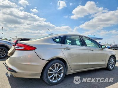 Trzecie zdjęcie samochodu z tyłu: 2018 FORD FUSION SE PHEV VIN:3FA6P0PU9JR187194 - miniatura