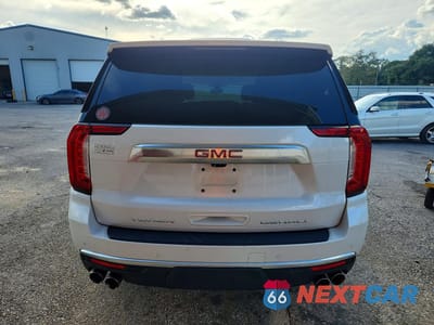 Zdjęcie 6 z 13 samochodu: 2021 GMC YUKON DENALI VIN:1GKS1DKL7MR111008 - miniatura