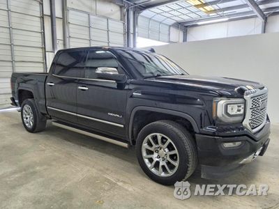Czwarte zdjęcie samochodu z boku: 2018 GMC SIERRA C1500 DENALI VIN:3GTP1PEC0JG230061 - miniatura