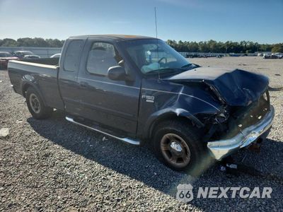 Czwarte zdjęcie samochodu z boku: 2002 FORD F150 VIN:1FTRX17W62NB94784 - miniatura