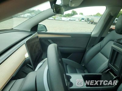 Zdjęcie 9 z 13 samochodu: 2023 TESLA MODEL Y VIN:7SAYGDEE0PA128941 - miniatura
