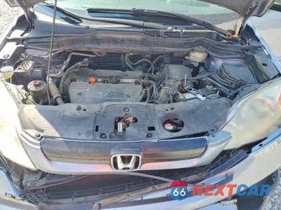 Zdjęcie 12 z 13 samochodu: 2009 HONDA CR-V LX VIN:5J6RE38389L008233 - miniatura