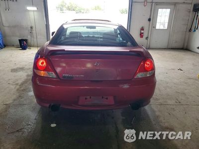 Zdjęcie 6 z 12 samochodu: 2006 HYUNDAI TIBURON GS VIN:KMHHM65D06U207085 - miniatura