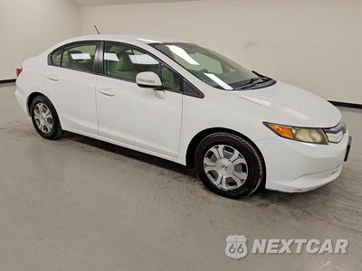 Czwarte zdjęcie samochodu z boku: 2012 HONDA CIVIC HYBRID VIN:JHMFB4F20CS000835 - miniatura