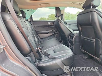 Zdjęcie 11 z 13 samochodu: 2021 FORD EDGE TITANIUM VIN:2FMPK4K95MBA29442 - miniatura