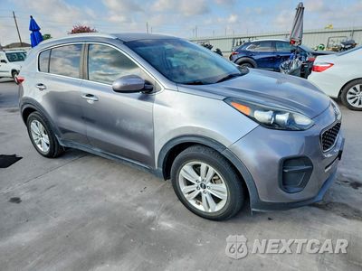 Czwarte zdjęcie samochodu z boku: 2019 KIA SPORTAGE LX VIN:KNDPM3AC9K7529941 - miniatura