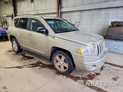 Czwarte zdjęcie samochodu z boku: 2010 JEEP COMPASS SPORT VIN:1J4NF4FBXAD511062 - miniatura