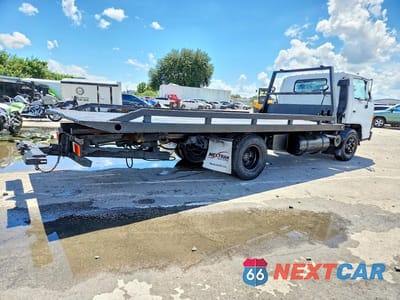 Trzecie zdjęcie samochodu z tyłu: 1994 ISUZU NPR VIN:JALB4B1K9R7003099 - miniatura