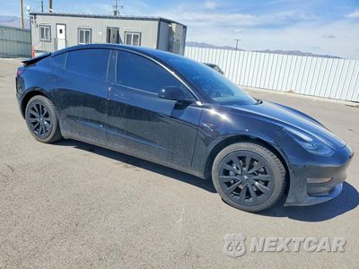 Czwarte zdjęcie samochodu z boku: 2021 TESLA MODEL 3 VIN:5YJ3E1EB1MF849687 - miniatura