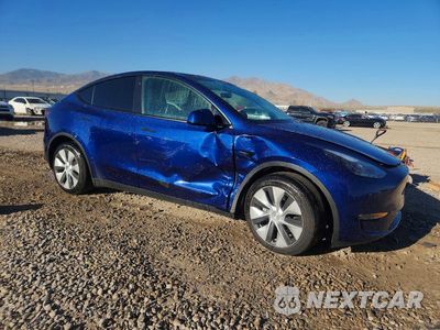 Czwarte zdjęcie samochodu z boku: 2023 TESLA MODEL Y VIN:7SAYGDEE1PF752461 - miniatura