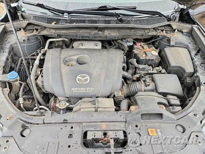 Zdjęcie 12 z 13 samochodu: 2014 MAZDA CX-5 GT VIN:JM3KE4DY8E0376008 - miniatura