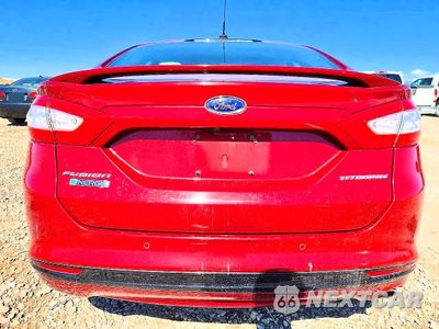 Zdjęcie 6 z 12 samochodu: 2016 FORD FUSION TITANIUM PHEV VIN:3FA6P0SU2GR315047 - miniatura