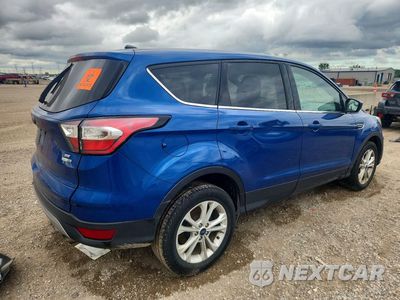 Trzecie zdjęcie samochodu z tyłu: 2017 FORD ESCAPE SE VIN:1FMCU9GD9HUF00754 - miniatura