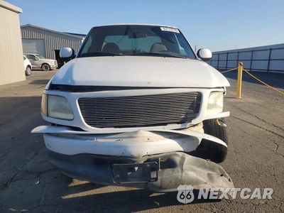 Piąte zdjęcie samochodu w środku: 2000 FORD F150 VIN:1FTRX07W1YKA80227 - miniatura