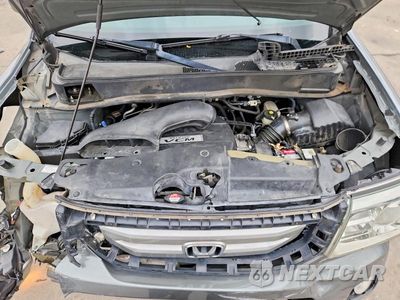 Zdjęcie 12 z 14 samochodu: 2009 HONDA PILOT EX VIN:5FNYF38479B004099 - miniatura