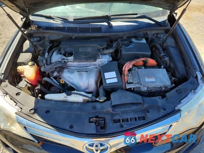 Zdjęcie 11 z 12 samochodu: 2012 TOYOTA CAMRY HYBRID LE VIN:4T1BD1FK0CU033908 - miniatura