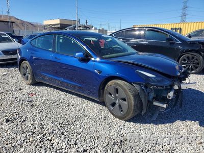 Czwarte zdjęcie samochodu z boku: 2023 TESLA MODEL 3 VIN:5YJ3E1EA2PF541536 - miniatura