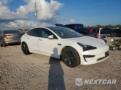 Czwarte zdjęcie samochodu z boku: 2022 TESLA MODEL 3 VIN:5YJ3E1EB8NF193277 - miniatura