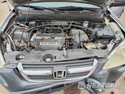 Zdjęcie 11 z 12 samochodu: 2002 HONDA CR-V LX VIN:JHLRD78452C089094 - miniatura