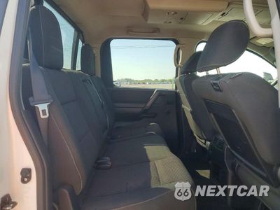 Zdjęcie 10 z 12 samochodu: 2014 NISSAN TITAN PRO-4X VIN:1N6BA0EC0EN500921 - miniatura