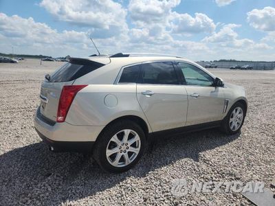 Trzecie zdjęcie samochodu z tyłu: 2015 CADILLAC SRX PREMIUM COLLECTION VIN:3GYFNDE37FS509598 - miniatura