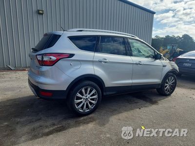 Trzecie zdjęcie samochodu z tyłu: 2017 FORD ESCAPE TITANIUM VIN:1FMCU9JDXHUD09451 - miniatura