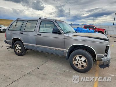 Czwarte zdjęcie samochodu z boku: 1992 GMC S15 JIMMY VIN:1GKDT13ZXN2507478 - miniatura