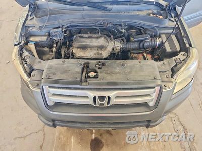 Zdjęcie 12 z 13 samochodu: 2007 HONDA PILOT LX VIN:2HKYF18107H504145 - miniatura